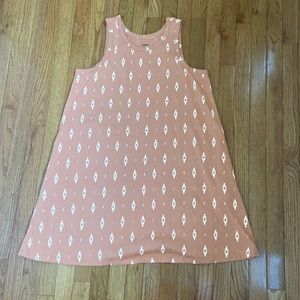 Sleeveless swing dress with pockets
